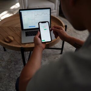 Person Holding Black Tablet Computer